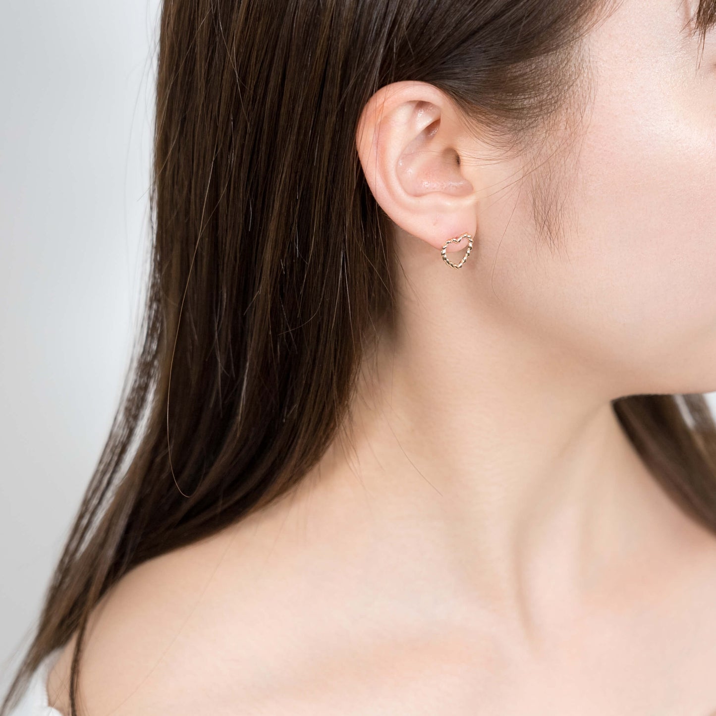 K10 オープンモチーフ スタッドピアス(ねじり-ハート)